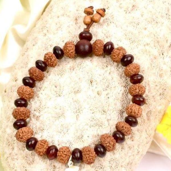 7 mukhi Mahalaxmi bracelet from Java with Red Sandalwood beads